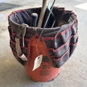 Bucket with assorted tools.