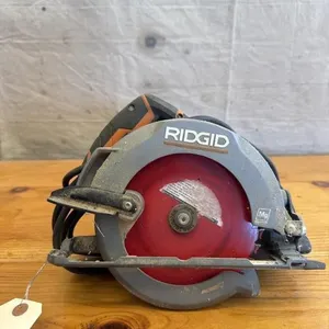 Rigid R3204 6 1/2 inch power saw. Plugged in and
