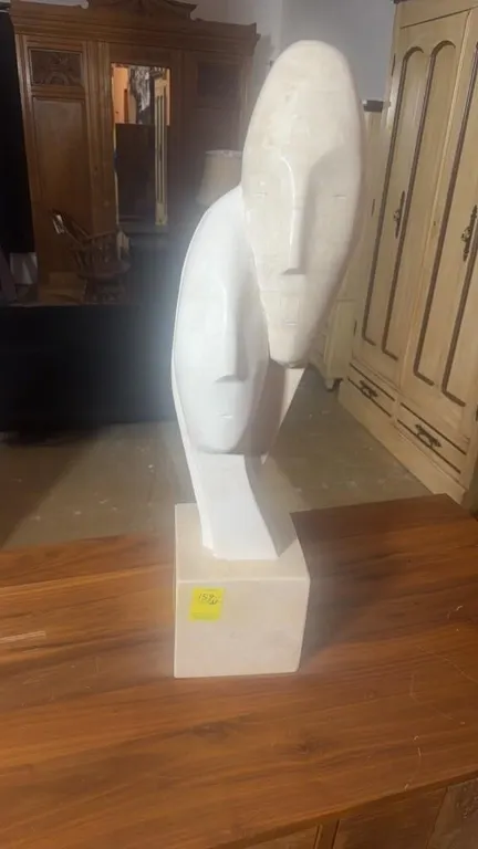 SCULPTURE INTERTWINED FACES