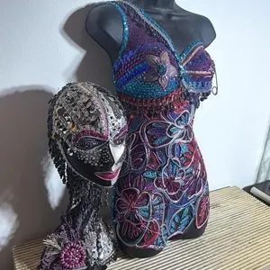 Beaded Bustier and Embellished Head Sculpture