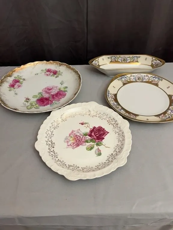 Assorted Porcelain Serving Dishes and Floral Decor