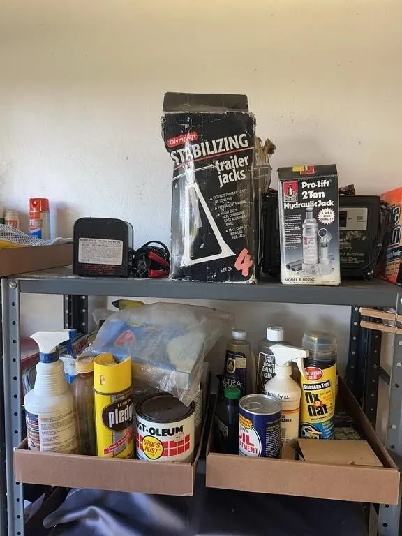 Automotive Garage Lot Featuring Hydraulic Jack Bat