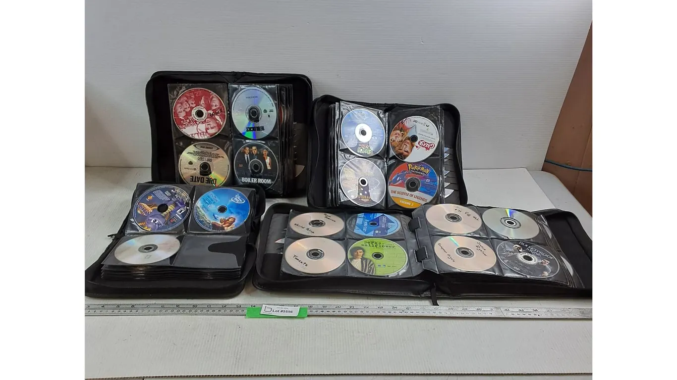 (4) Binders of Unsorted DVDs - As Is