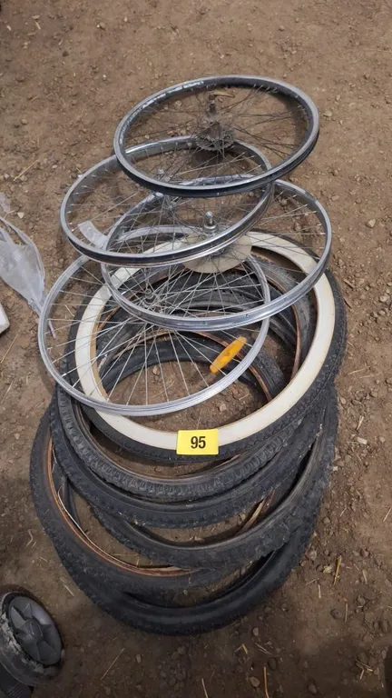 4-Bicycle rims and 6 tires