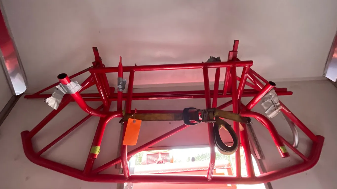 Red Tubular Steel Race Car Bumpers and Frame Components