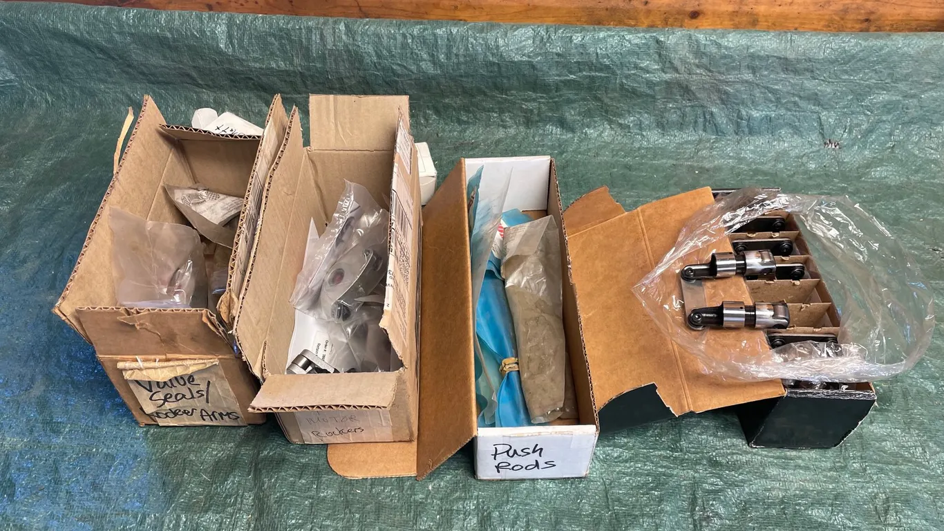 (4) Boxes of Engine Valvetrain Components Including Rocker Arms, Pushrods, Roller Lifters, and More
