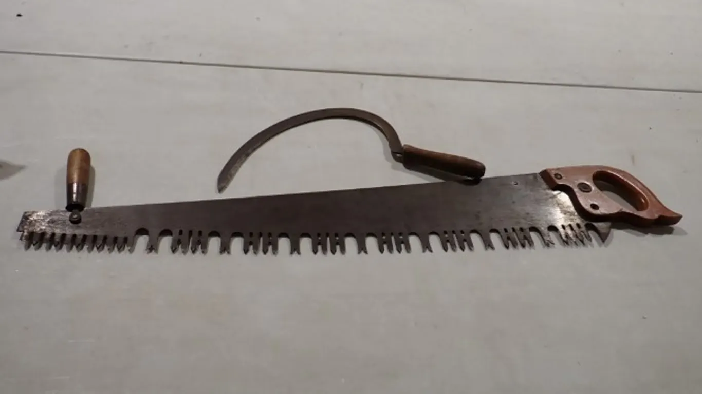 Vintage Saw and Hand Sickle