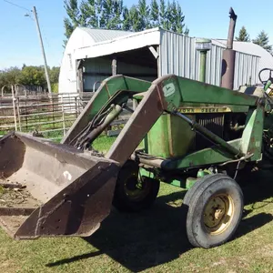 John Deere 3010 tractor w/ front end loader & duals, 3060 hours showing, dual hydralics