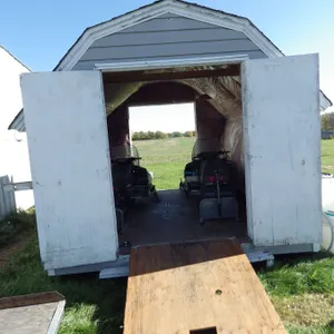 Insulated shed with doors on both ends