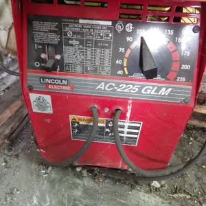 Lincoln Electric AC-225 GLM Arc welder with cables and 2 welding hemets
