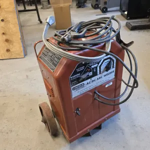 (#17) Lincoln Electric AC/DC 225/125 Arc Welder With Wheels