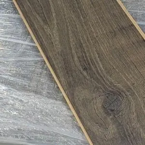 556.74 SQ FT. OF MOHAWK LAMINATE PLANK FLOORING- COLOR NUTMEG