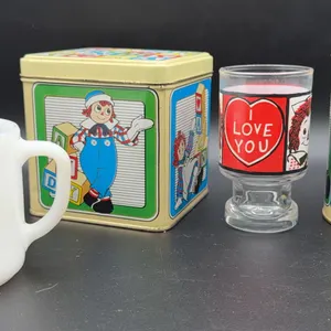 Federal Glass Raggedy Ann & Andy Mug, 1972 Bobbs Merrill Juice Glass, 2 Tins