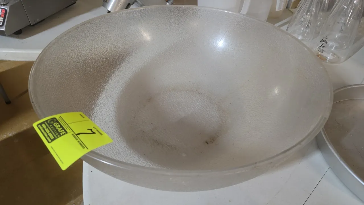Polycarbonate serving bowl. Features a pebbled exterior finish and smooth interior. 24"Dia.