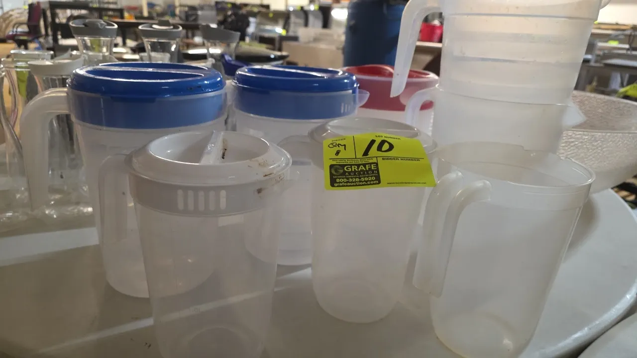 Assorted plastic beverage pitchers. Features translucent plastic construction with integrated handles and pour spouts. Includes (8) pitchers in assort