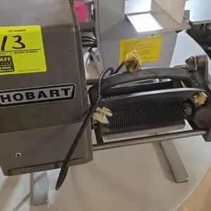 Hobart cuber with blades