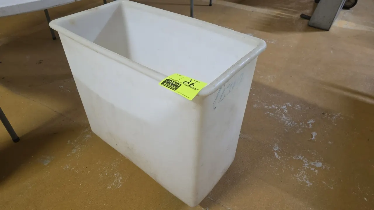 Mobile poly ingredient bin. Features molded polyethylene construction with open top. 27" x 13.5" x 27". Mounted on swivel casters. Lid not included.