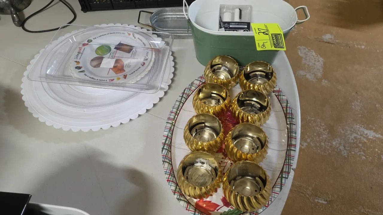 Assorted plastic trays and metal containers lot. Includes assorted plastic serving trays, clear plastic display cover, oval printed serving tray with