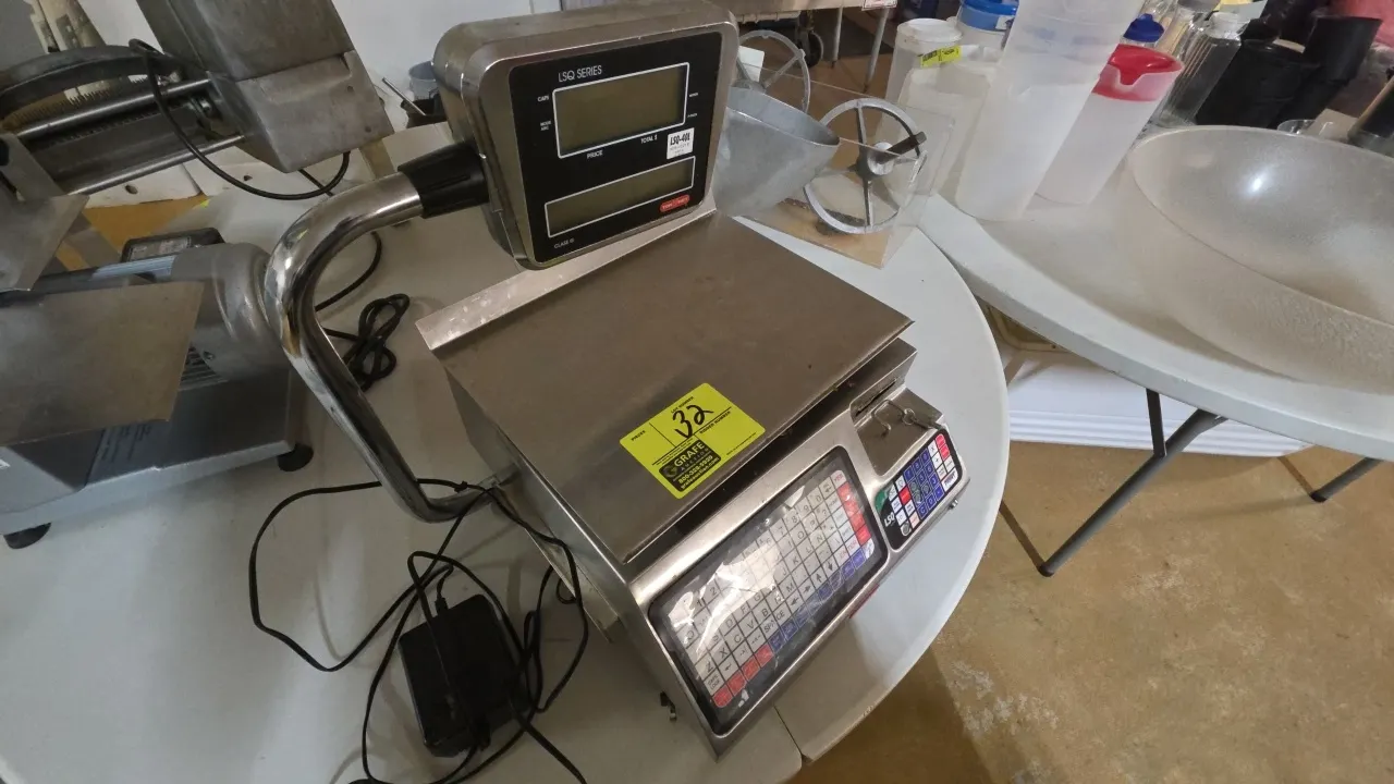 Tor-Rey LSQ-40L price computing scale. Features stainless steel construction, raised tower display, built-in label printer, full alphanumeric keypad,