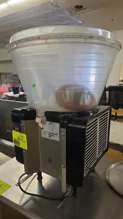 Cornelius Jet Spray EJ1 single-bowl refrigerated beverage dispenser. Features a clear conical bowl with lid, stainless steel and black housing, and in