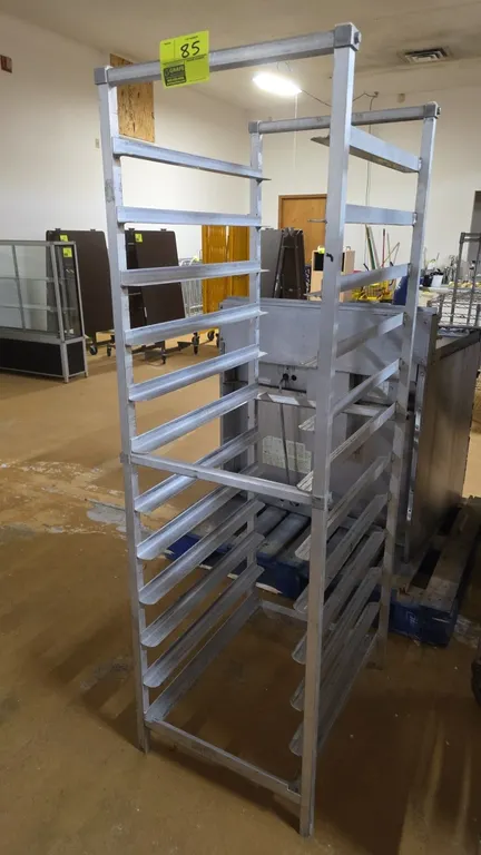Aluminum 11-channel sheet pan rack. Features aluminum construction with 11 runner levels for standard sheet pans. Stationary base.