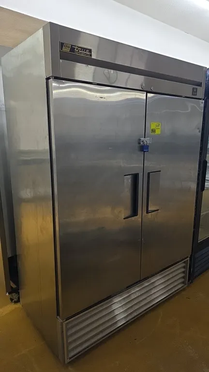 True T-49 2-door commercial reach-in refrigerator. Features stainless steel construction, recessed door handles, digital temperature display, and bott