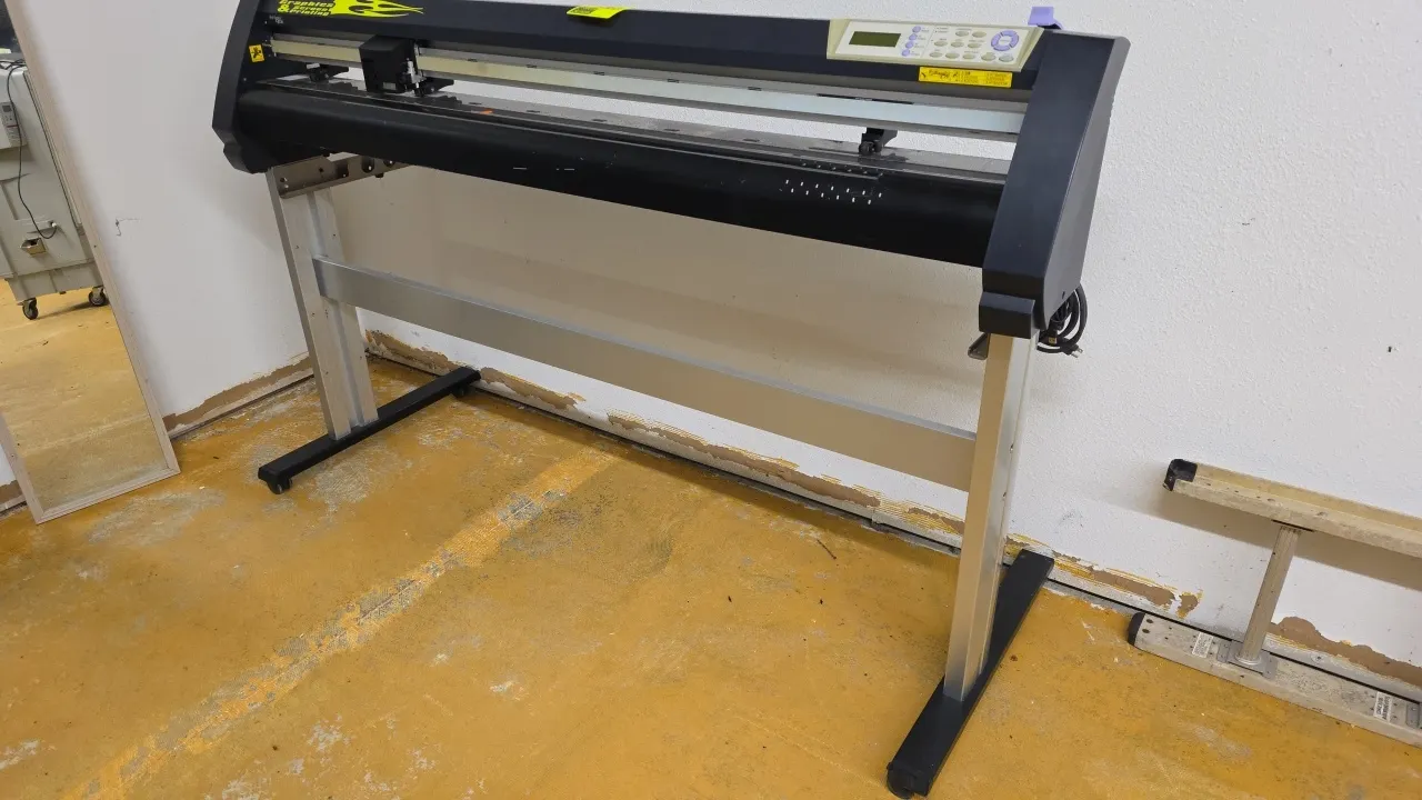 Vinyl Express Q130 vinyl cutter plotter. Features digital control panel with LCD screen, 54" cutting capacity, and rear media roll brackets. Dimension