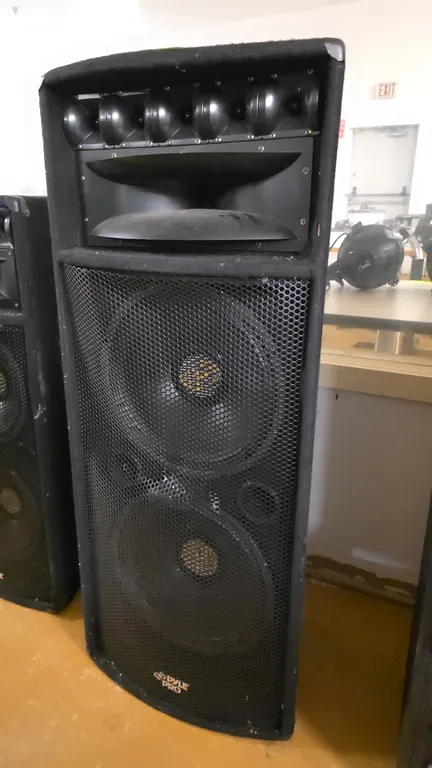 Pyle Pro PADH215 loudspeaker. Features dual 15" subwoofers, 6"x17" super horn midrange, and five piezo tweeters in a black carpeted cabinet with metal
