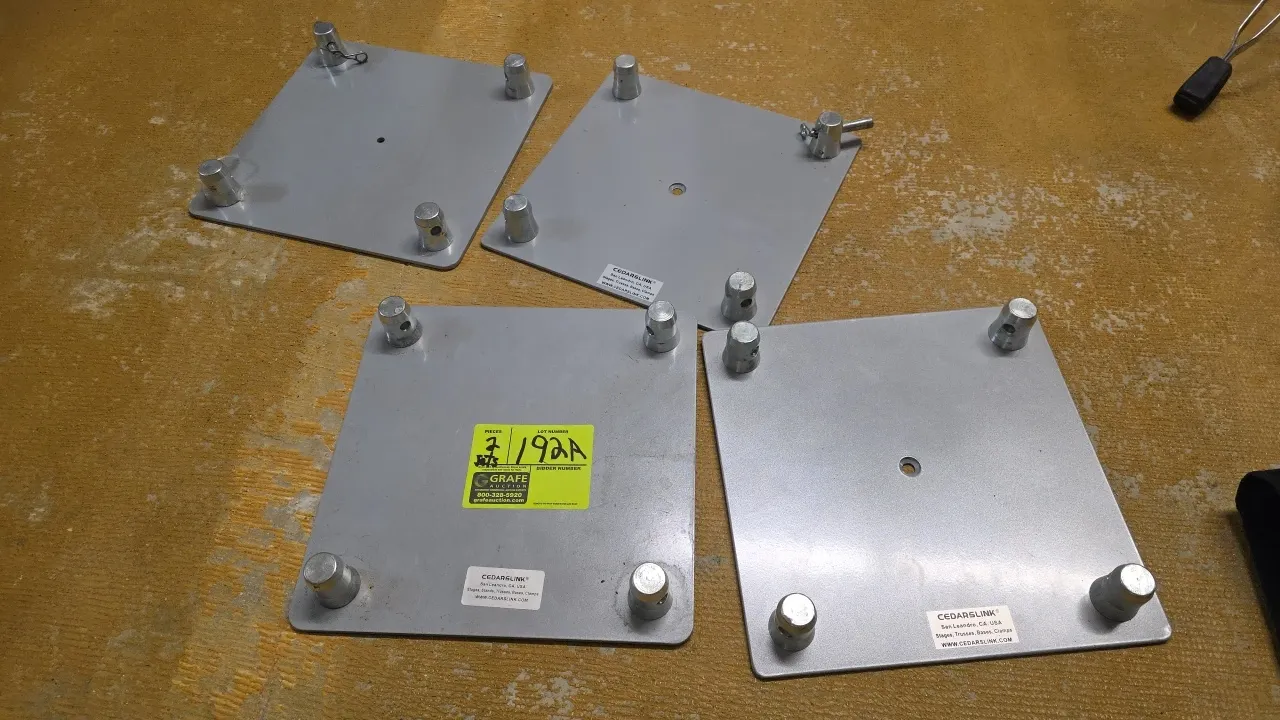 Cedarslink metal truss base plate sets. Features four conical couplers per plate and center mounting hole. Dimensions: 12" x 12".