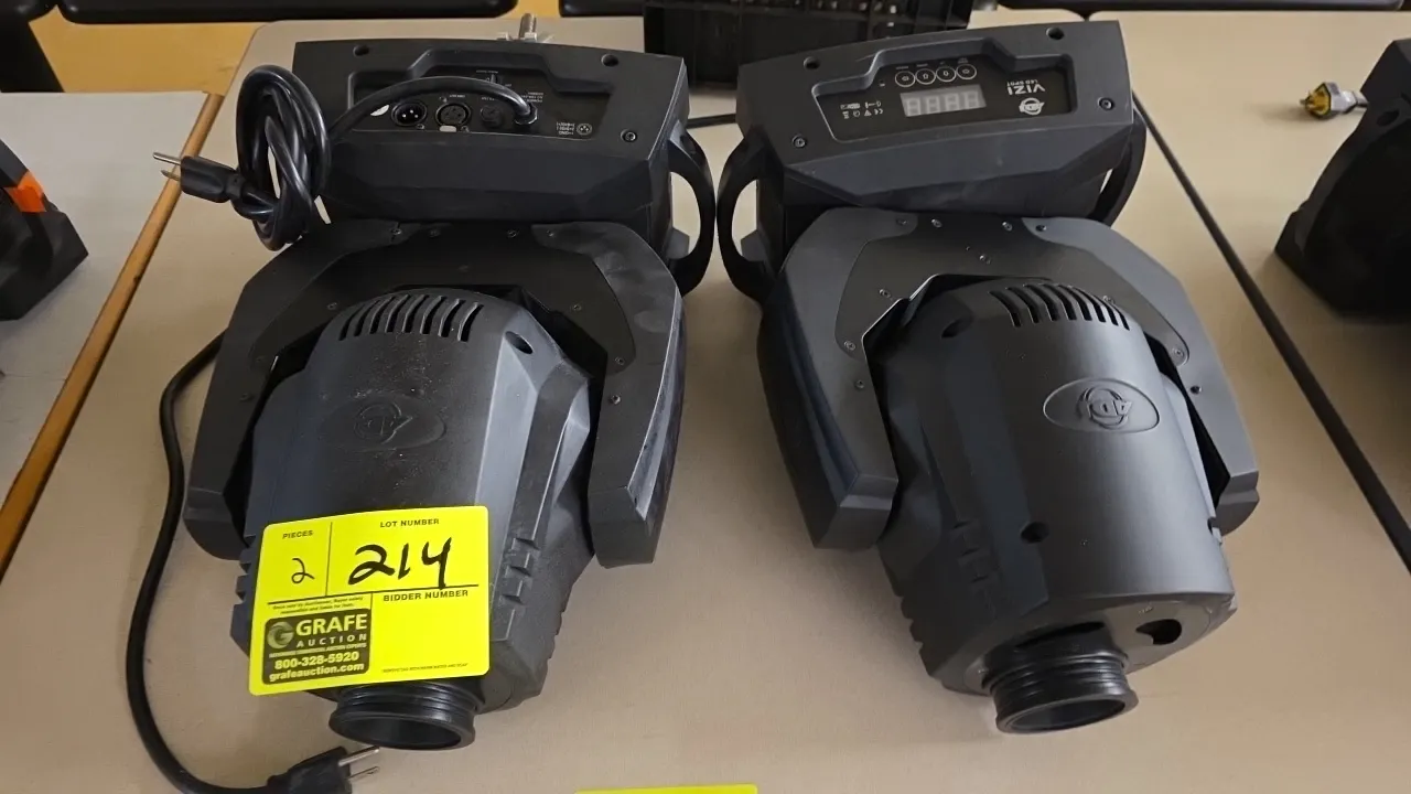 ADJ Vizi LED Spot moving head stage lighting fixtures. Features LED menu display with 4-button navigation, 3-pin DMX in and out, and manual focus ring