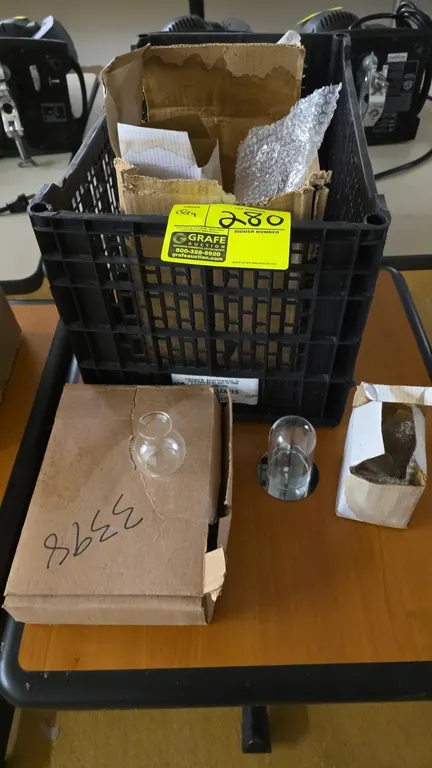 Assorted miniature glassware. Includes miniature clear glass vases and a miniature glass cloche display dome with a mirrored base. Packaged in boxes w