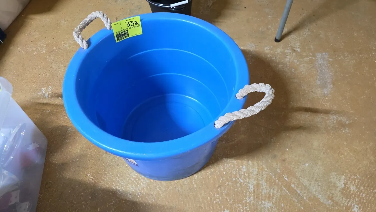 Poly utility tub. Features blue molded plastic construction and dual rope handles. Dimensions: 21 1/2" Dia. x 17"H.