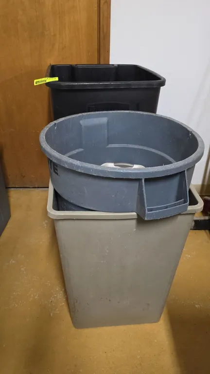 Assorted plastic trash cans and wastebaskets. Features molded polyethylene construction in assorted styles and colors. Includes (1) Rubbermaid Brute r