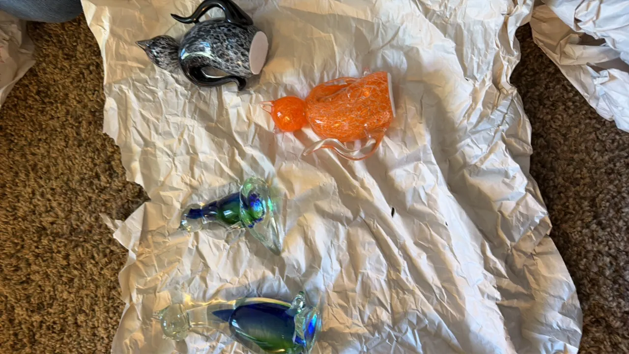 Glass blown cats (one is broken apart)
