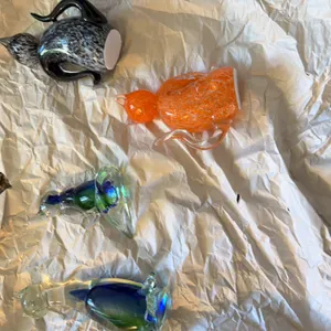 Glass blown cats (one is broken apart)