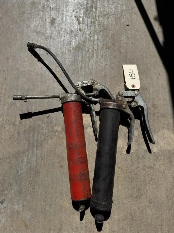 Two pistol grip grease guns