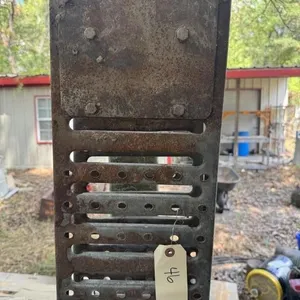 Metal ramps. One ramp is bent.