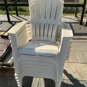 6 white Adirondack plastic chairs