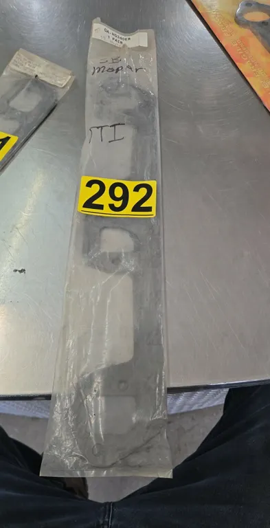Part GA-HG340ER is a set of TTi header gaskets