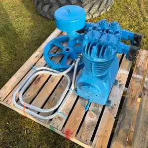 Unused DeVilbiss compressor head with pulley and pipe. (GST 5% charged)