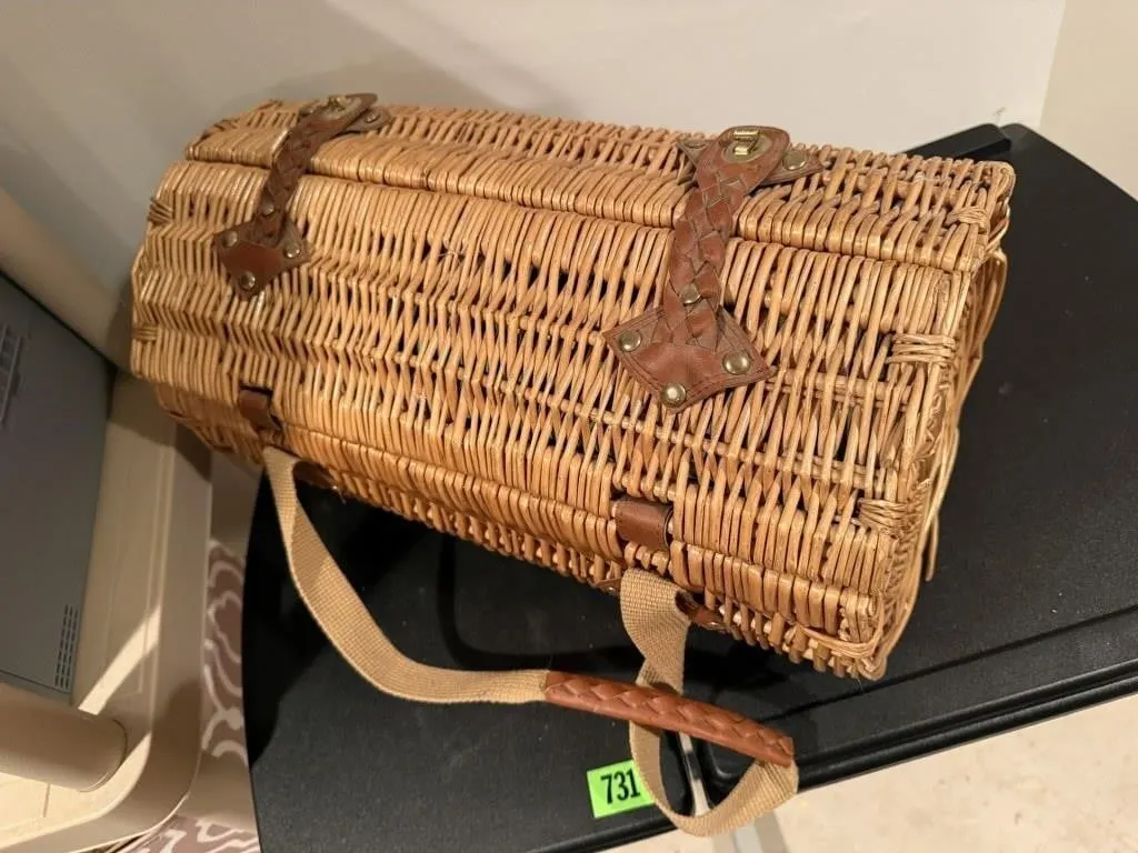 Oblong wicker picnic basket, partial contents