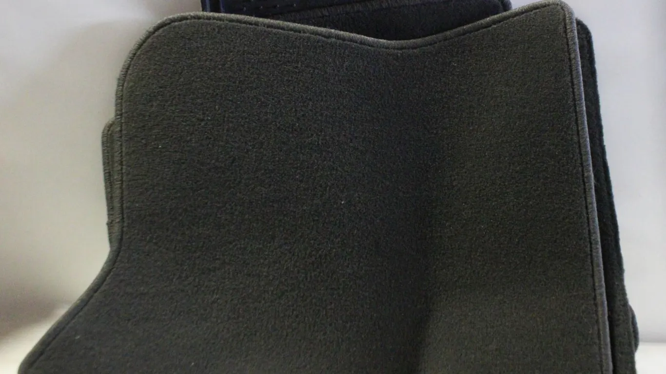 4 MISC. BLACK CARPET FLOOR MATS