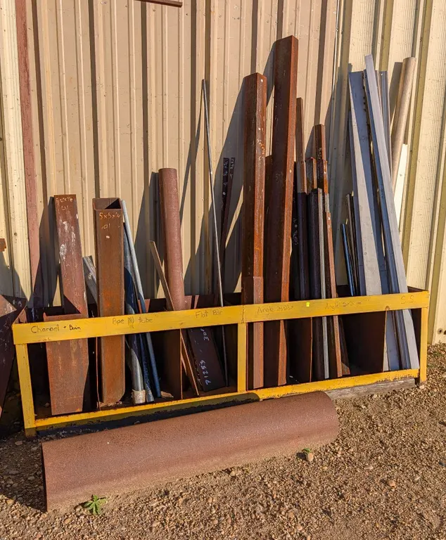 CONTAINER OF ASSORTED METAL STOCK INCL: ANGLE IRON