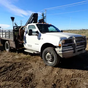 2002 Ford F-550 SD XL Regular Cab 4x4 DRW Deck Truck. VIN 1FDAF57F92ED21353. NOTE: REGISTERED IN AB.