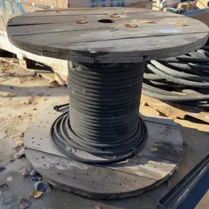Large Spool of Soaker Hose on Wooden Cable Reel