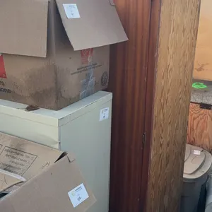 Tall Wood Storage Cabinet & Storage Tote with Deck Sprayer, Sump Pump, Chain Oil & Garage Supplies