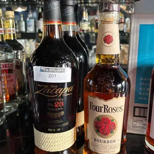 (4) BOTTLES OF MIXED LIQUOR