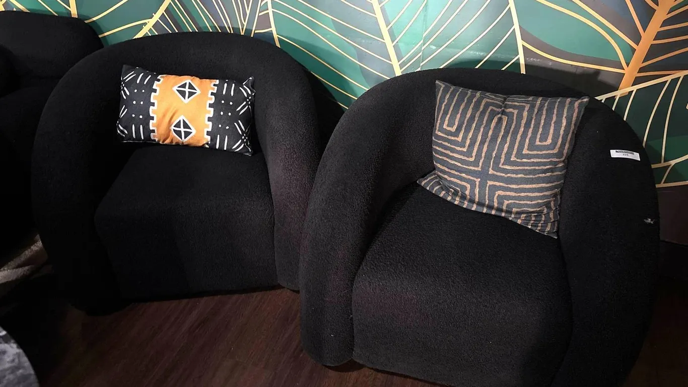 (2) PLUSH BLACK SWIVEL CHAIRS