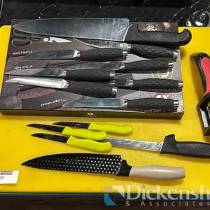 LOT OF KNIVES AND CUTTING BOARDS