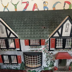 Vintage dollhouse with furniture